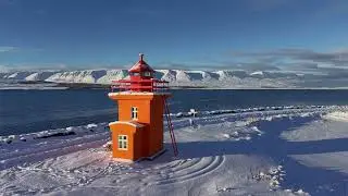 Bright Orange Lighthouse in a Snowy Wonderland | Stunning Winter Coastal Drone Footage 🧡❄️