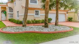 15880 NW 16th Ct, Pembroke Pines, FL Presented by Tom Carroll, P.A., CRS, ABR.