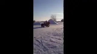 ATV on Frozen Yard in Manitoba