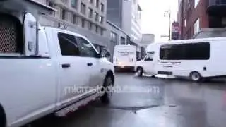 Police truck using megaphone on rioters