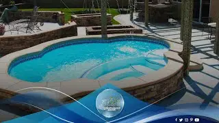 The Crystal Beach &ndash; A Small Free Form Pool with Attached Spa