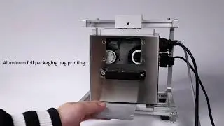 Thermal transfer overprinter for printing on flexible materials, printing barcodes, logos, real-time