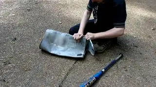 Smashing the mailbox with old metal bat