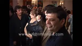 Dilip Kumar with wife Saira Bano arrive for Naya Daur music launch, Saira helps Dilip put on coat