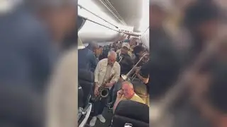 A band was stuck in flight delay hell. So they picked up their instruments.