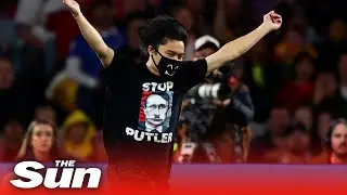 Anti-Putin protester invades pitch during World Cup final between England and Spain