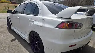 Film Installers Mobile Window Tinting Service. Tinting Rear Windshield - 2012 Mitsubishi Lancer EVO