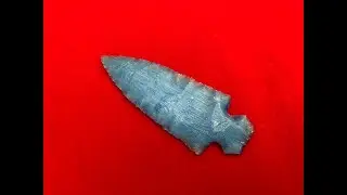 207 - Flint knapping a slab of blue fiber optic glass.1/1