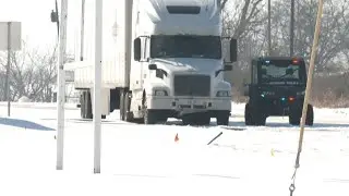 Big rigs stuck on icy Denison highway