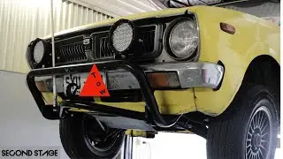 Custom tow hook for a rally corolla