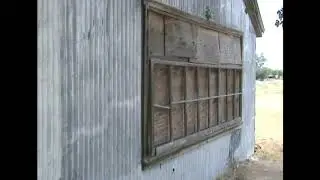 Examining Old 1920s Sinclair Gas Station in Elberta Utah June 8,2009