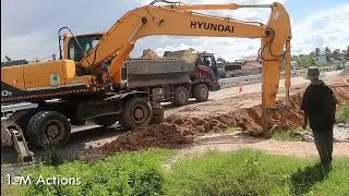 Excavator loading with dump truck.Y43
