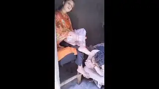 boy is drinking the water to wash the girl's feet
