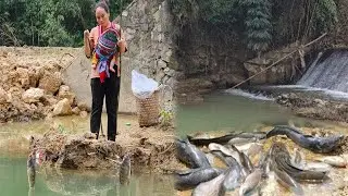 single mother and her son, over a year old, go fishing under the harsh and dangerous sun