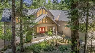 Nestled Creekside in Pine Brook, you will find this contemporary custom Mediterranean home.