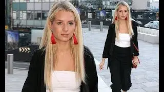 Lottie Moss cuts a chic figure in a white bandeau and black blazer at Bluebird launch party
