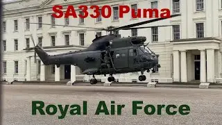 Royal Air Force SA 330 Puma helicopter landing and takeoff in London near Buckingham Palace