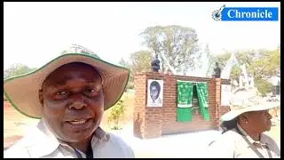 Forestry Commission Chief Conservator Mr Armstrong Tembo on the plaque unveiling
