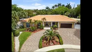 Key West-style smart home on &frac12;-acre in the heart of Weston!