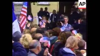 Bush visits war cemetery, plus Memorial Day speech