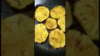Grilled Pineapple cooking on a pan