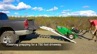 Finishing prep work on a 750' driveway. Using a Billy Goat Outback brush cutter.