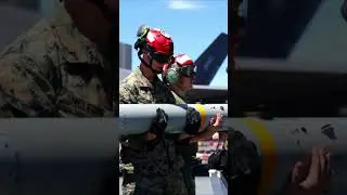 US Marines load air interceptor missiles and launch F 35B Lightning II aircraft