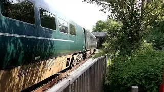 A pair of 47 haul a load of Mk. 4 coaches off to scrap