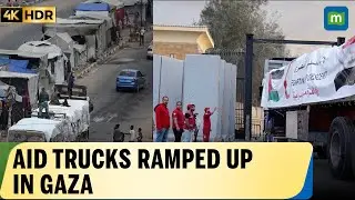 Aid trucks swarmed in Gaza’s Khan Younis as locals grab aid following ceasefire deal