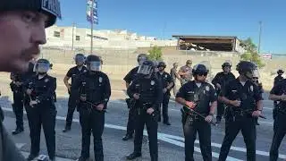 Tempers Flare as Demonstrators and LAPD Face Off at Anti-ICE Protest