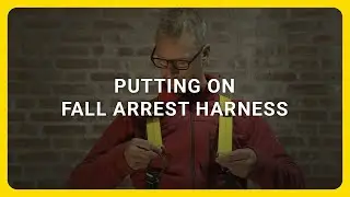 Putting on fall arrest harness - Working at Height