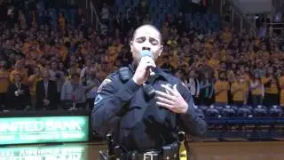Police officer gives awesome rendition of national anthem after singer gets stuck in snowstorm