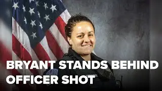 Bryant stands behind injured officer shot in the line of duty