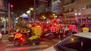 Israeli security forces on site of shooting attack in Tel Aviv | AFP