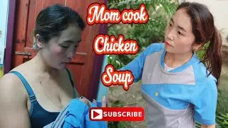 Mom cooks chicken soup