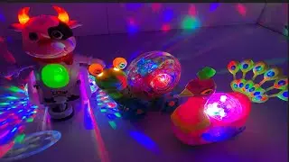 Electric peacock & dancing cow unboxing  as toys ￼