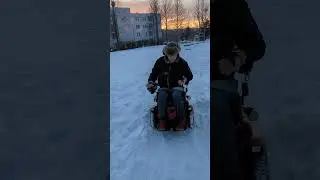 I am learning how to use the snow chains better on my electric wheelchair.