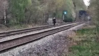 Why is this idiot walking on the railway line at sutton park