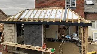 Installation of 2 cranked steel beams and hipped roof