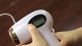 Hand-held hair removal machine