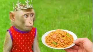 Princess YaYa wears a crown and enjoys a delicious plate of noodles