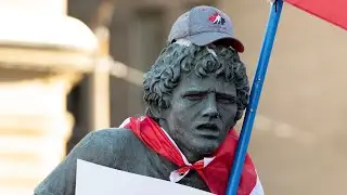 Protesters deface Terry Fox statue, dance on war memorial