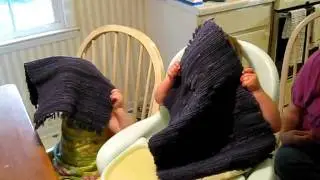 Nathaniel and Mollie play at the table