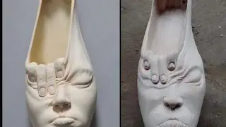 wood carving tribal busket designe girl face