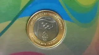 Complete album of Olympic coins. Mint flower