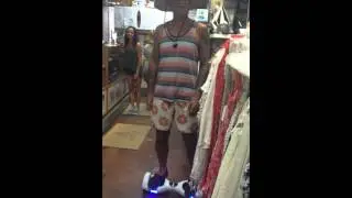 My friend Gary Jules on The Hover Wheels at a surf store