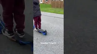 Leyton riding scooter