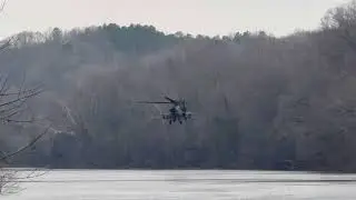 NC National Guard Boeing AH-64E Apache Guardian [22-03443] flying over the Cape Fear River 