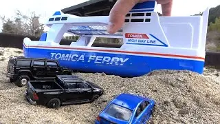 12 cars from around the world [Tomica] & a large Tomica that can hold cars