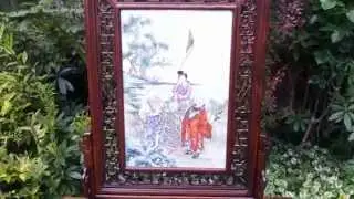 A Chinese Porcelain Table Screen Huanghuali Frame